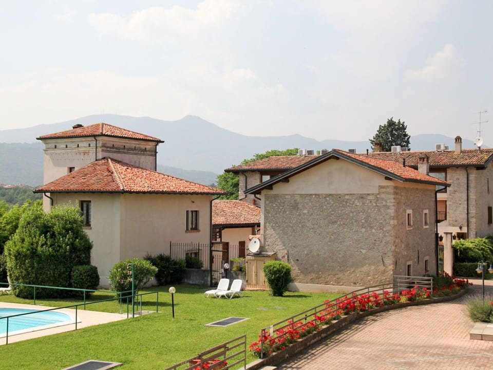 Plant, Property, Residential Area, House, Neighbourhood, Land Lot, Roof, Building, Shrub, Real Estate