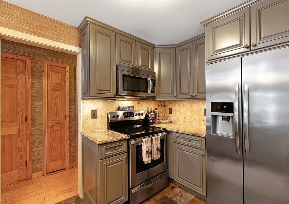 Kitchen area with coffee and espresso machine (not pictured).
