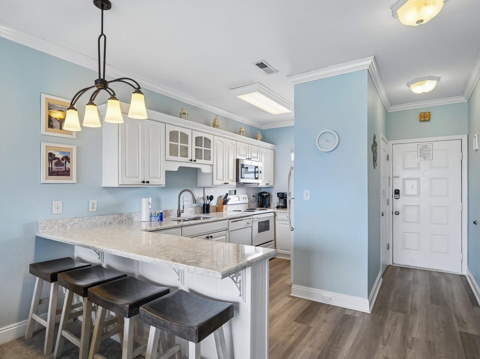 Fully Equipped Kitchen + Breakfast Bar Seating Four