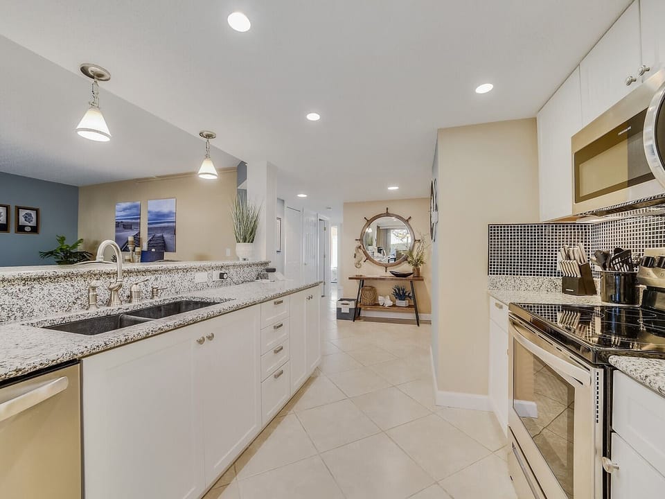 Nicely Updated Kitchen with Stainless Steel Appliances at 1674 Bluff Villa