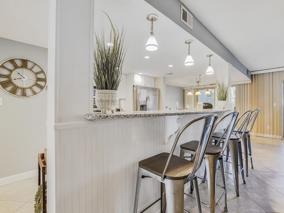 Kitchen with Breakfast Counter at 1674 Bluff Villa