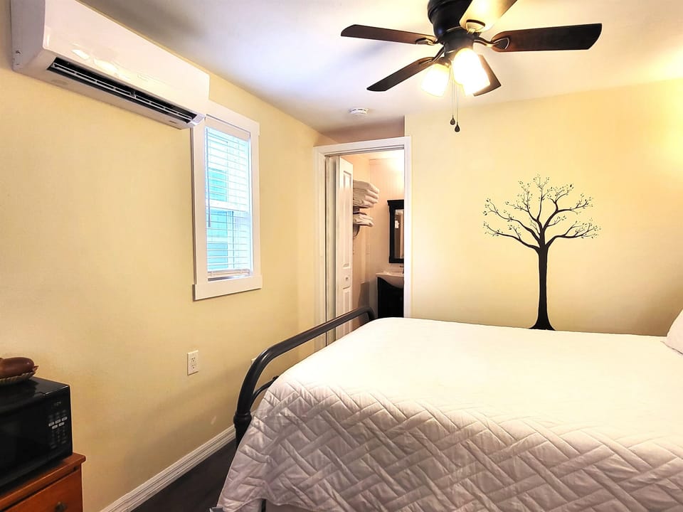 Acorn offers queen bed, custom mural, and mini split AC (quiet)