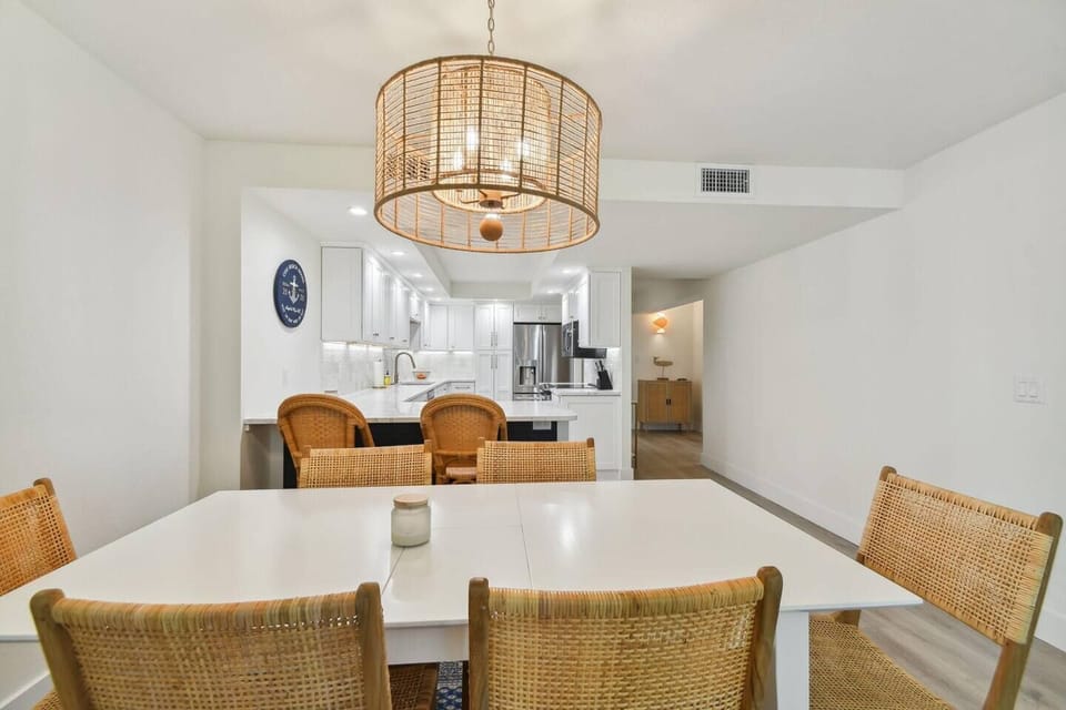 Dinning area with breakfast bar in the background