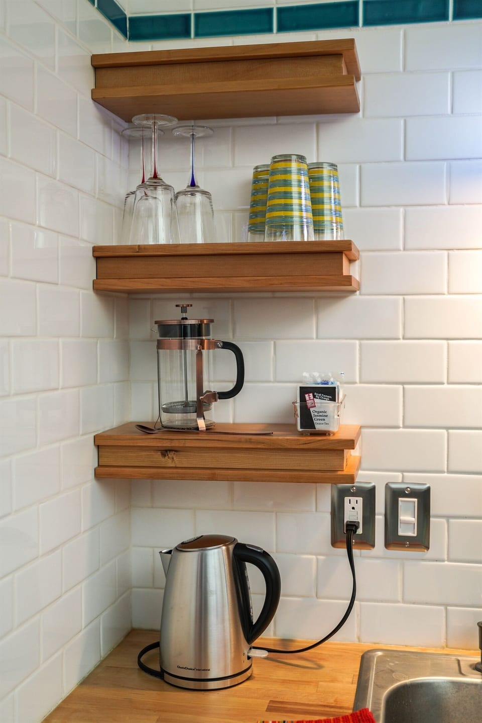 The Patio Cottage kitchen is well-equipped.