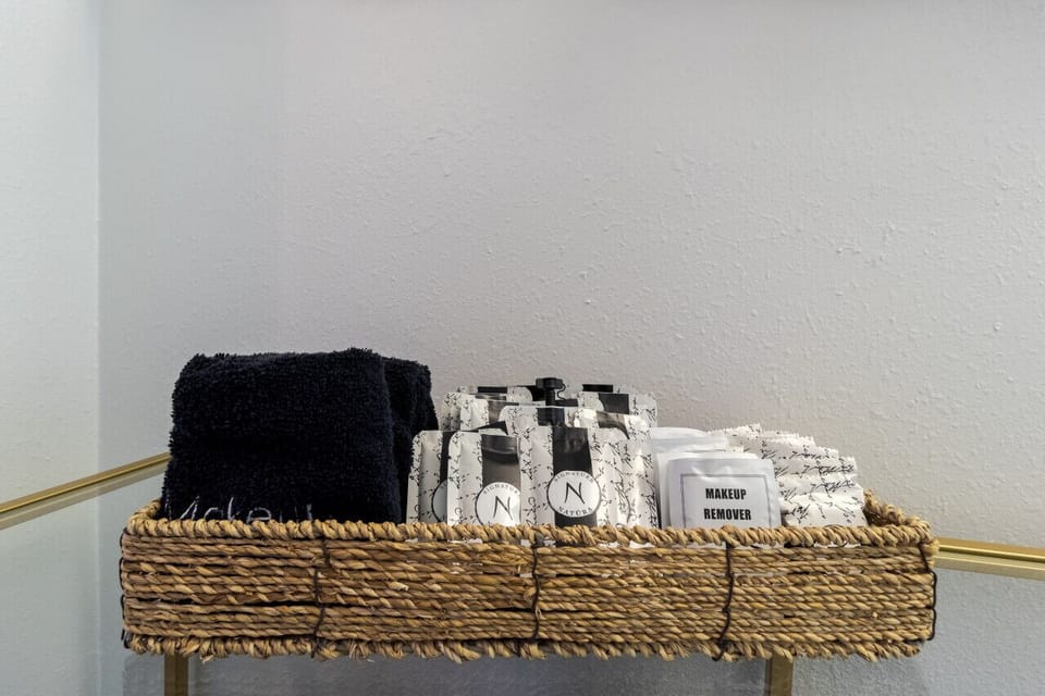 Starter shampoo, conditioner, soap and black make-up wash cloths