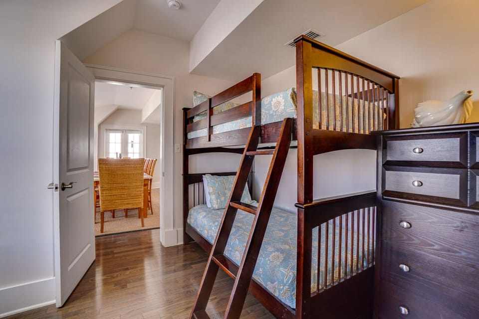 Your kids will love these sturdy wooden bunk beds, complete with built-in storage drawers for all their vacation treasures.