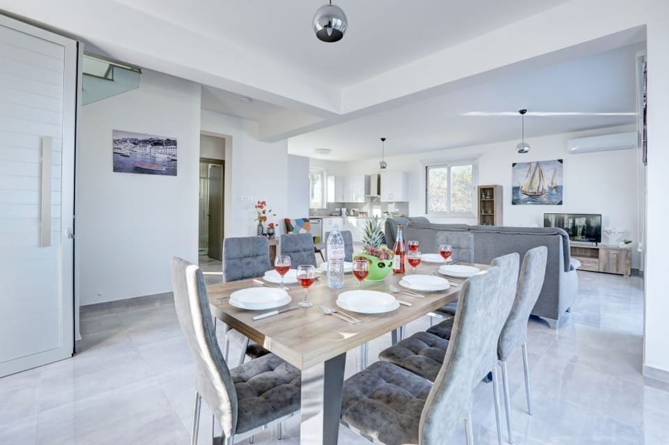 Dining Area with table and chairs to seat 8 people