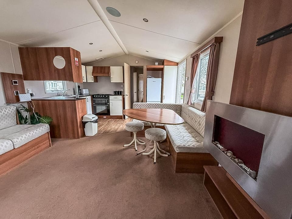 Cozy living and dining area with ample natural light