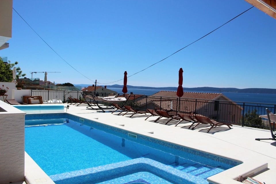 Pool. swimming pool-sun deck-patio-sun beds