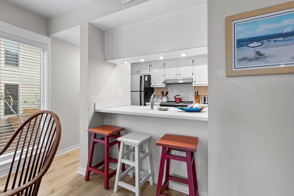 Extra barstool seating at the kitchen counter