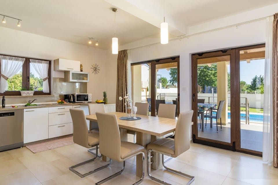 Kitchen area. Dining area and a fully equipped kitchen.