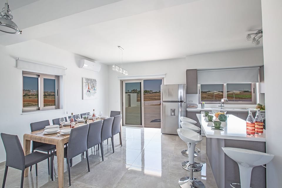 Dining Area with table and chairs to seat 10 people