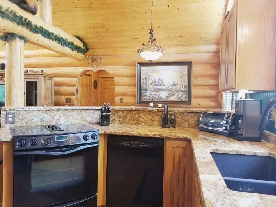 Electric oven, stove top, dishwasher, toaster oven, coffee maker and utensils