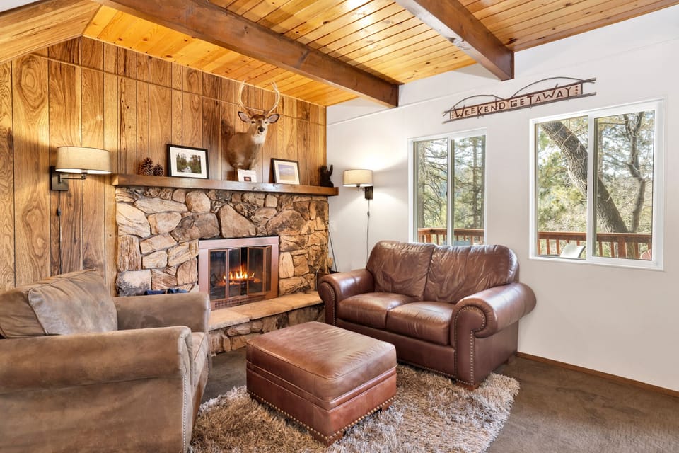 A warm and welcoming living room featuring plush seating, soft lighting, and tasteful décor. The open layout and cozy ambiance make it perfect for relaxing, entertaining, or enjoying quiet moments.