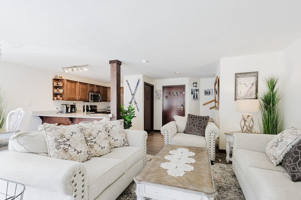 Living room area with fold-out queen bed.