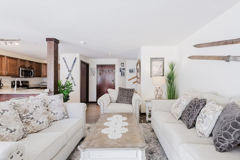 Living room area with fold-out queen bed.
