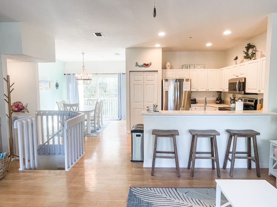 Living room opens to kitchen and dining room