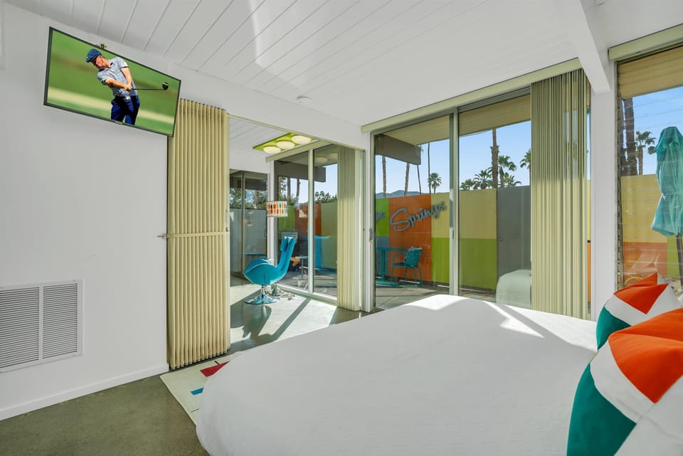 Your view from bed. Original accordian privacy screen to enclose the bedroom.