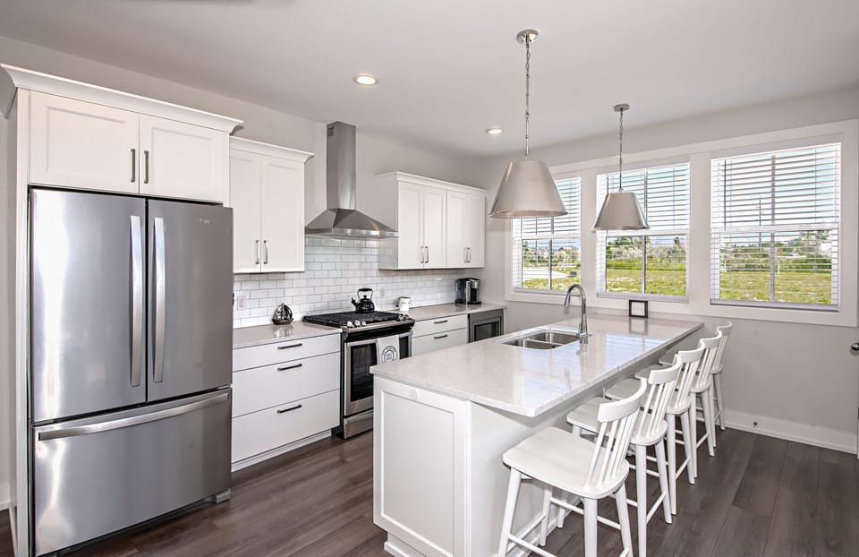 quartz counters and stainless appliances