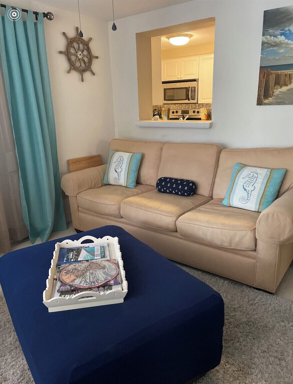 Den with 2 couches and one is a Natuzzi sofa bed 