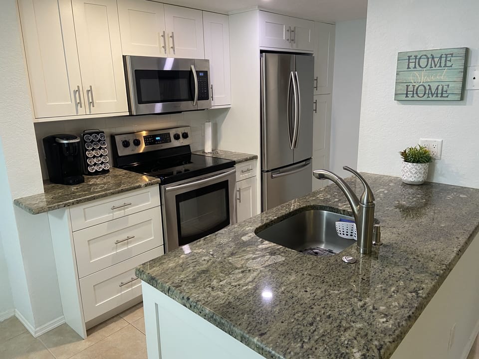 Granite Counter, Samsung Stainless Steel Appliances, Easy Shut Cabinets, Keurig