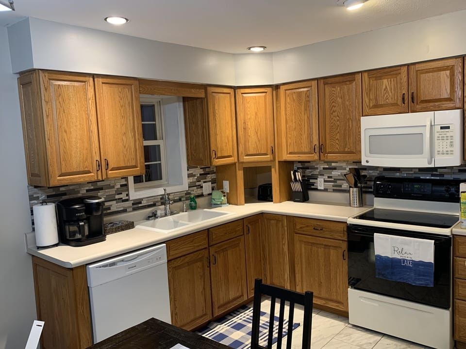 Updated kitchen fully stocked with everything needed to prepare any meal. 