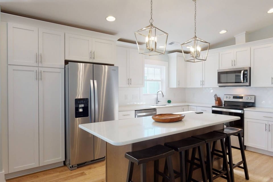 Enjoy a large open gourmet kitchen with updated appliances and all the tools to make that great meal