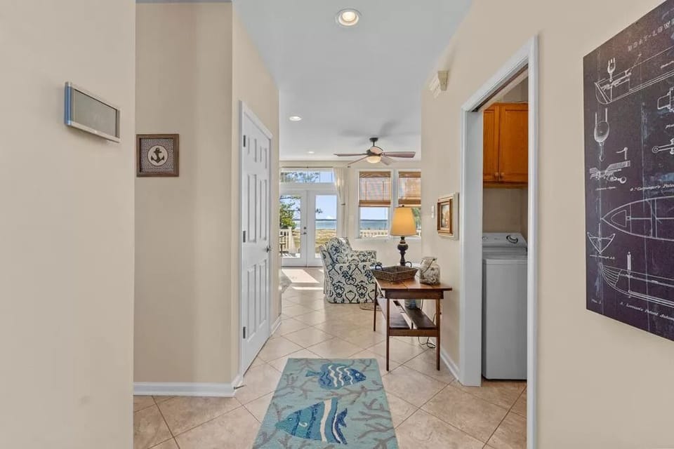 view upon entering the house-- kitchen to the left, beach straight ahead!