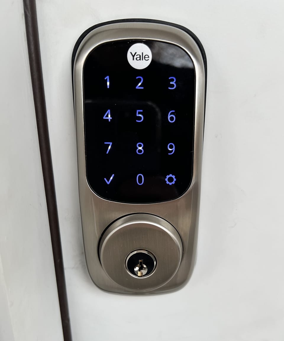 Smart lock with keypad.  You get your own code that only works during the stay