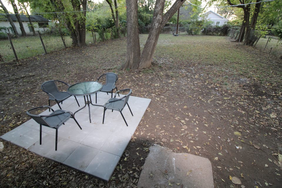 Large backyard with patio area