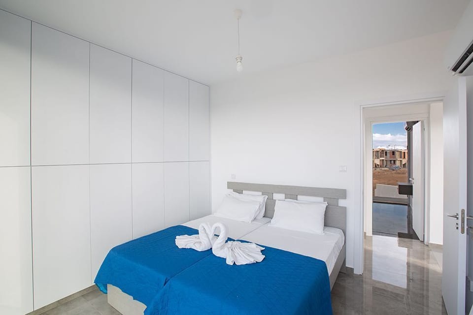 Bedroom 2 with two single beds