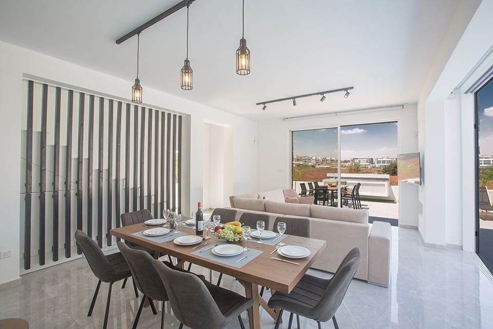 Dining Area with table and chairs to seat 8 people