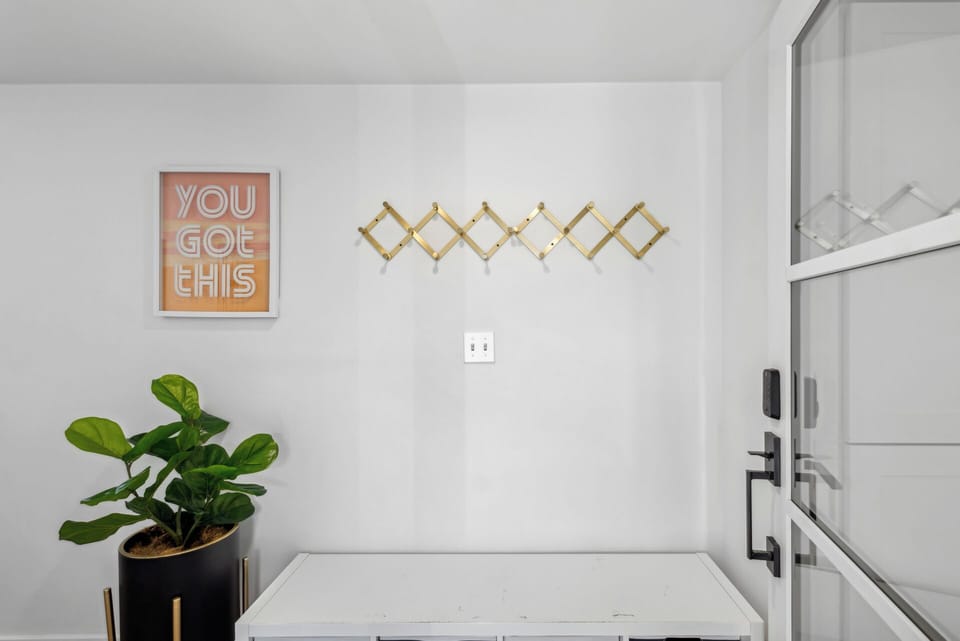 Upstairs front door, storage for shoes, jackets, etc..