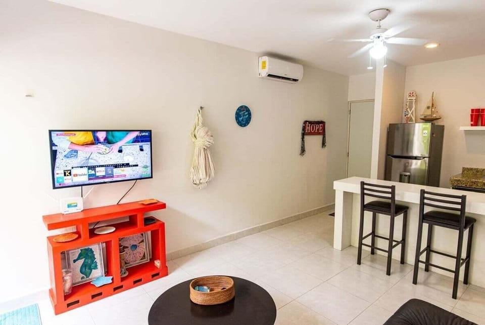 A spacious living-room, with an open kitchen concept for more air and light flow.