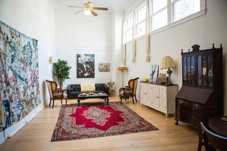 Stay in (British) style in our loft with 14 foot tin ceilings and bright northern light.