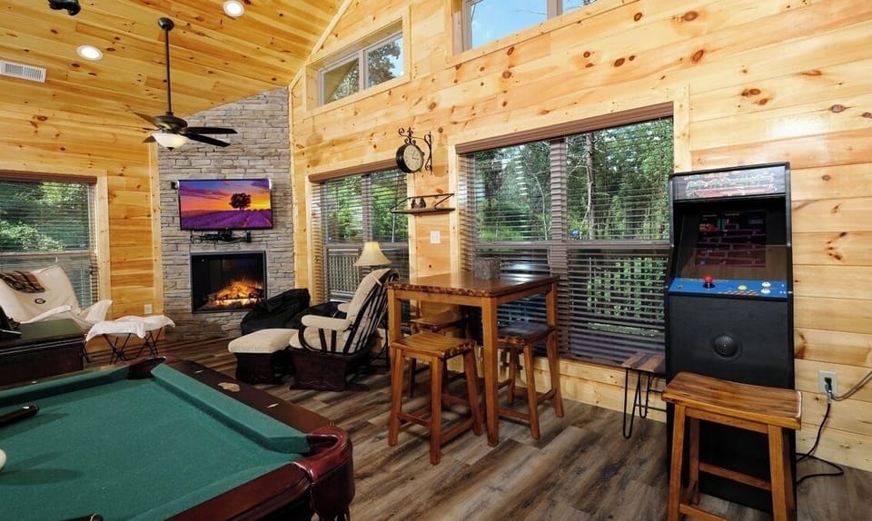 Smart TV, multi-arcade and electric fireplace in the game room upstairs