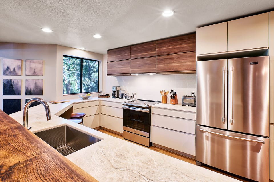 A spacious chef's kitchen is equipped with everything  your inner-foodie needs.