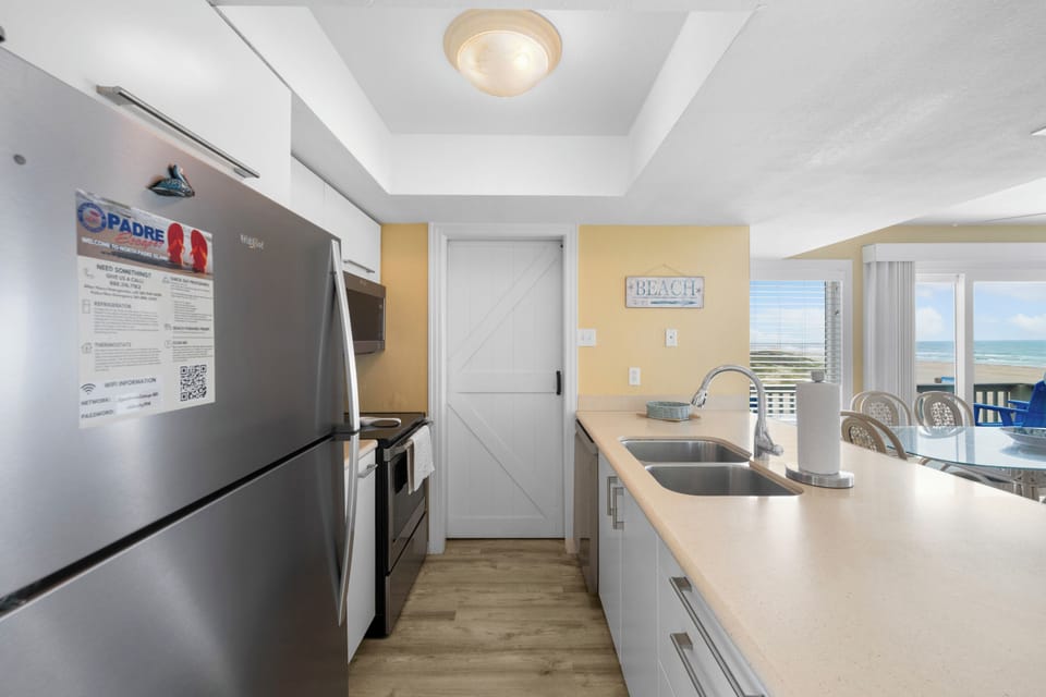 Your open-concept kitchen is made for entertaining, with sleek stainless steel appliances, generous counter space, and an easy flow into the dining area—perfect for gathering, cooking, and connecting.