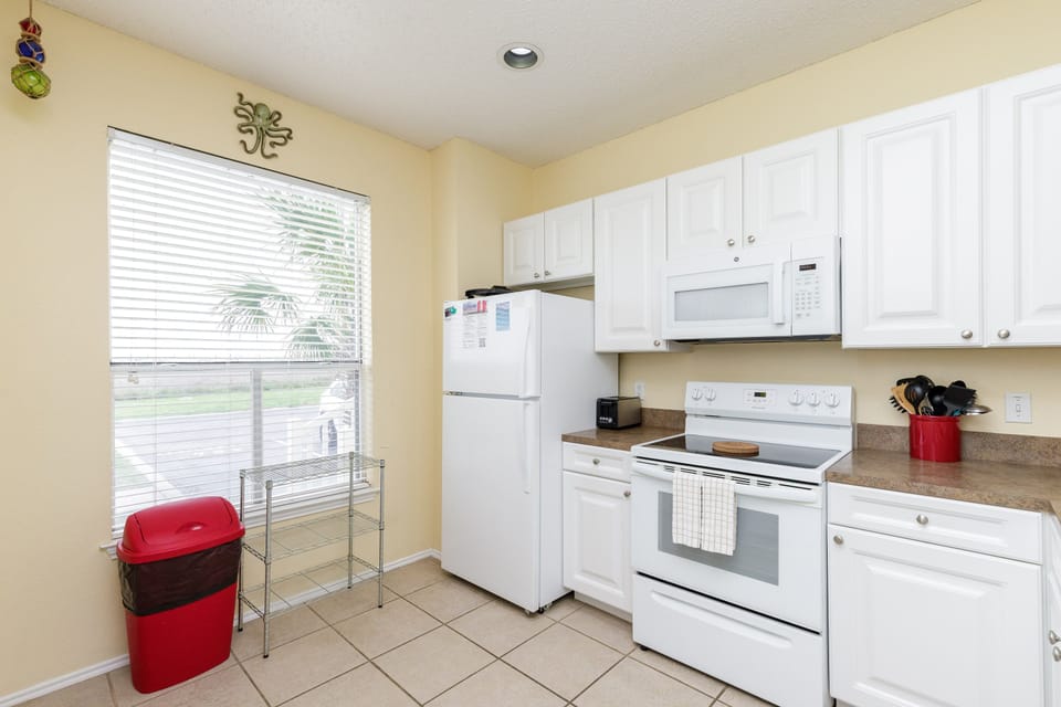 Your fully equipped kitchen features modern appliances and plenty of storage, perfect for preparing meals during your stay.