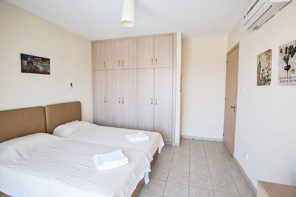 Bedroom 1 with two single beds