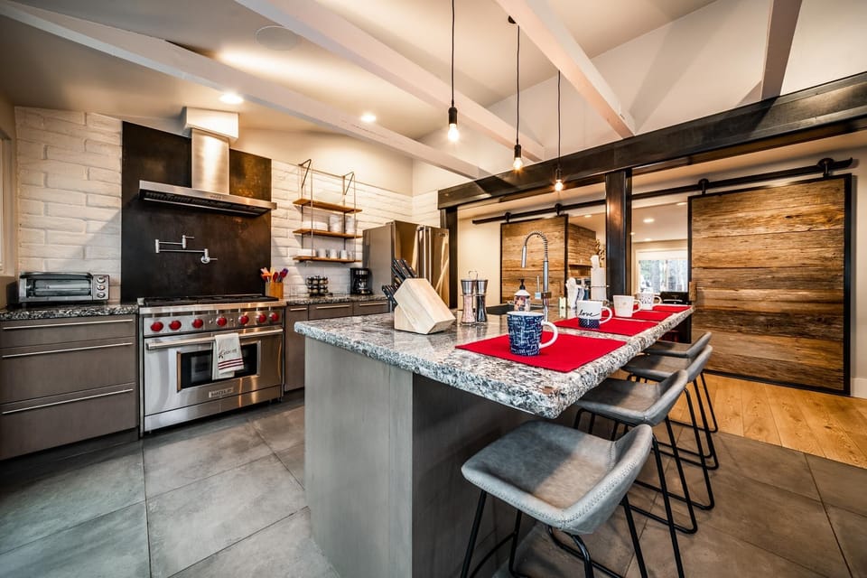 Modernly furnished kitchen with lots of countertop space!