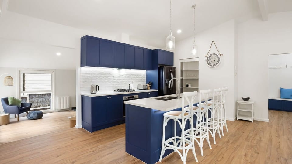 Blue Beachside Kitchen Leading onto second living room