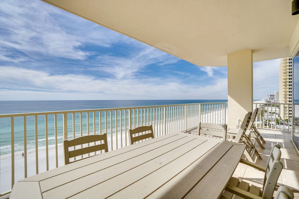 Step onto your private balcony where ocean breezes meet comfortable seating and endless sea views stretch before you.