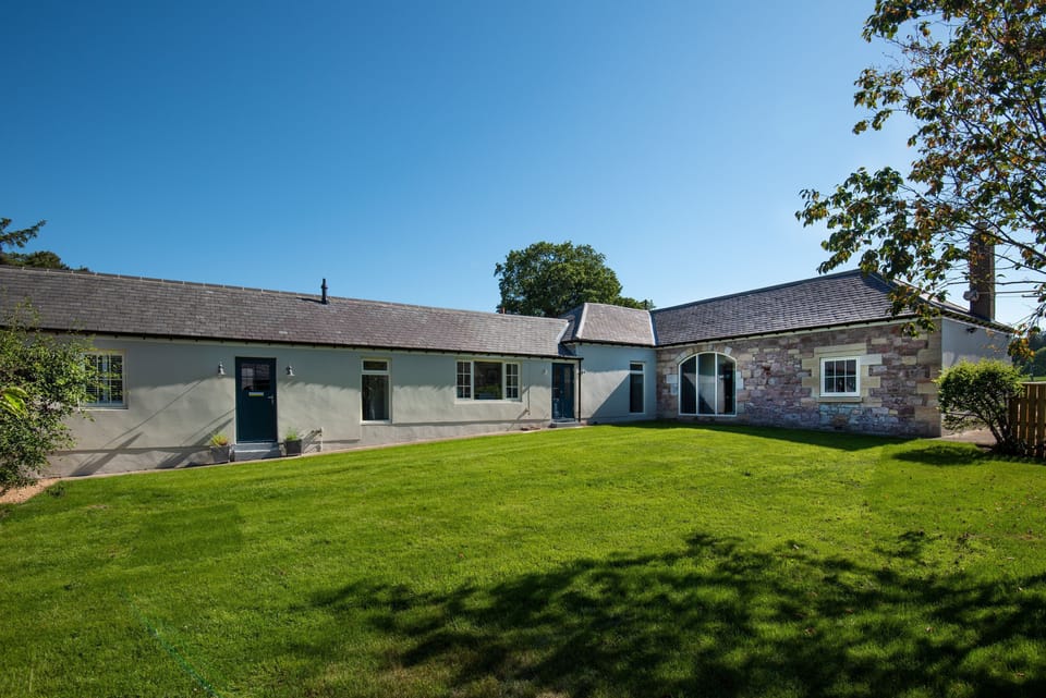 Overview Cottage - enclosed lawned garden and front aspect of the property