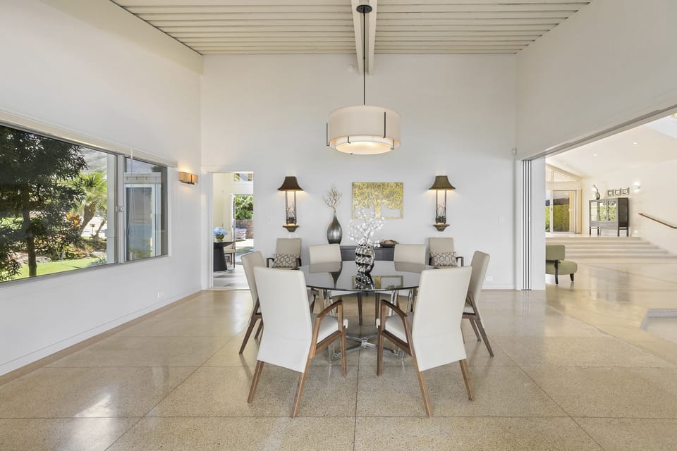 Dine in style with a flexible space that can be opened to the living room or closed for privacy.