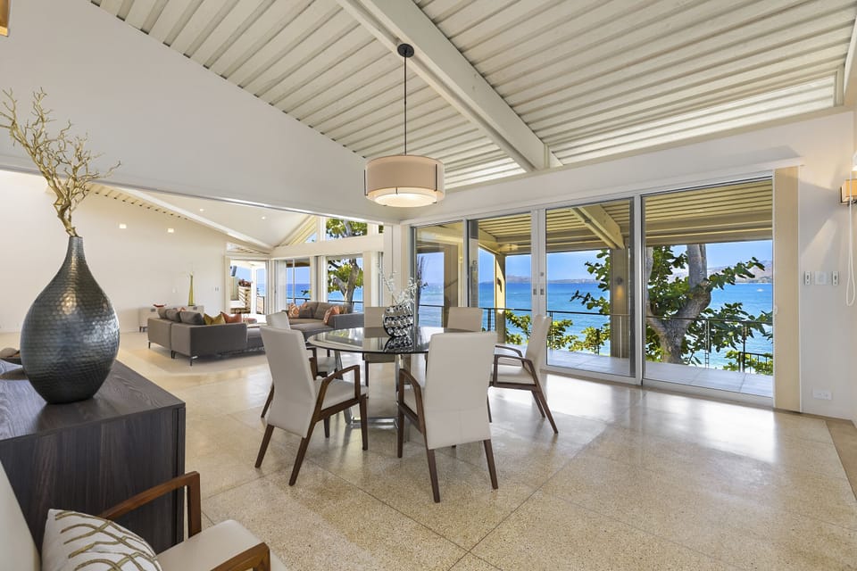 Share memorable meals in a dining room surrounded by ocean, mountain, and garden views.