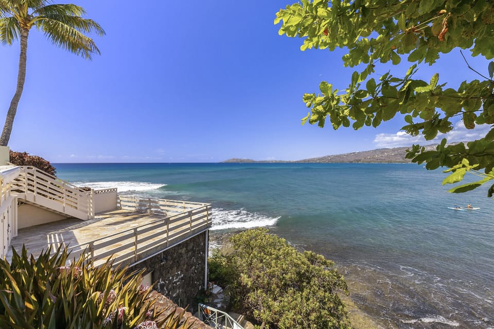 Watch the sun set over Diamond Head from your own private waterfront perch.
