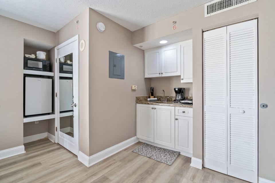 An efficiency kitchen is convenient for snack time.