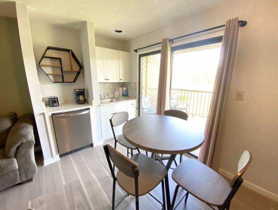 Remodeled kitchenette with a nice dining table