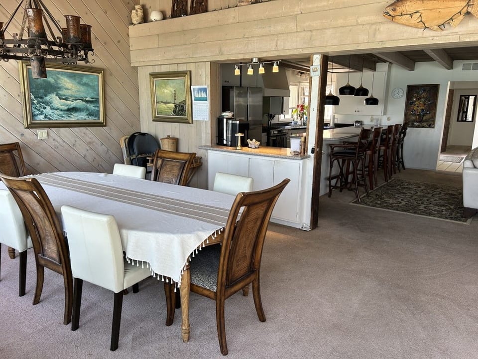 Dining room & kitchen in background